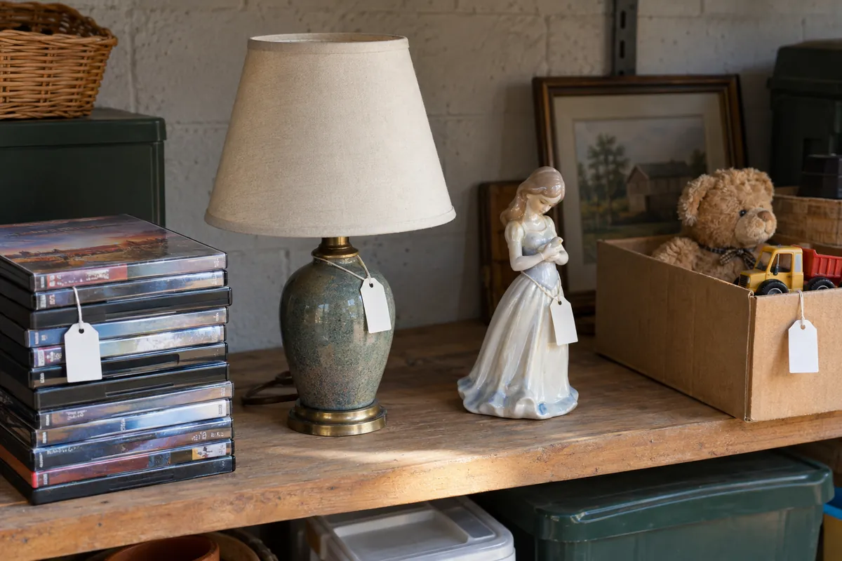 A garage shelf of items that have not sold yet